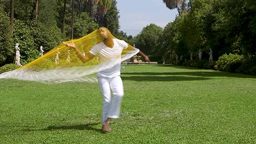 Man dancing on green grass