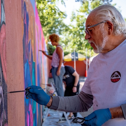 Emmanuel Martinez paints a mural