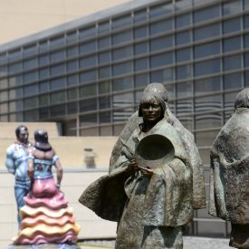bronze sculptures of people